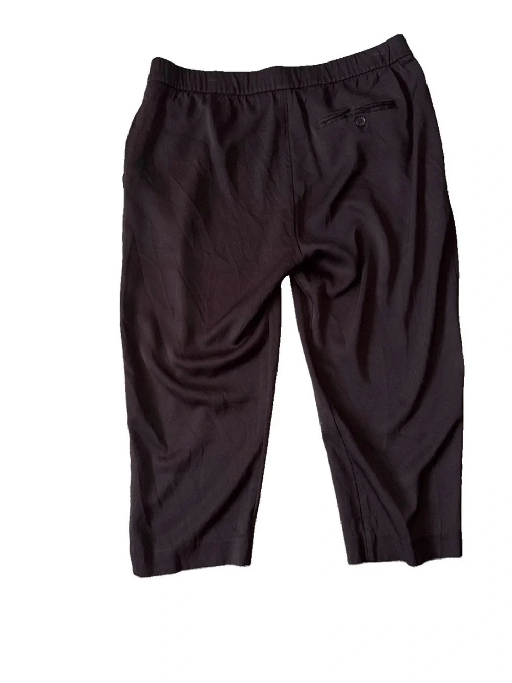 A sleek pair of Reiss women’s trousers in classic black, designed with a comfort